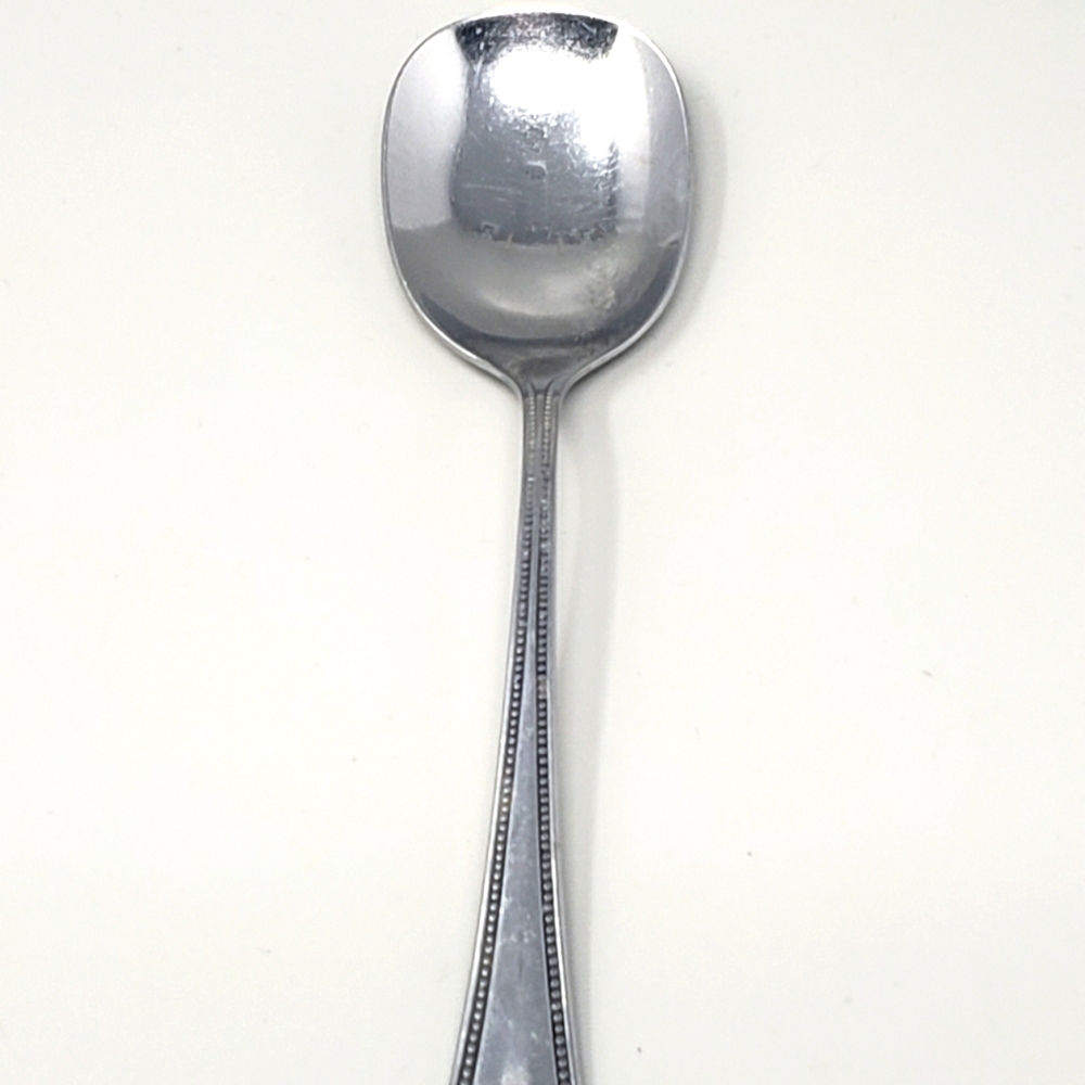 Oneida Needlepoint Sugar Spoon